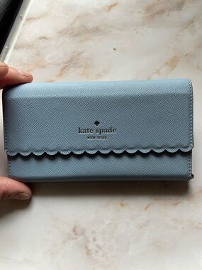 kate spade light blue scalloped flap phone wallet